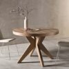 Mesa redonda de madera modelo Roma con patas cruzadas diseño moderno para comedor