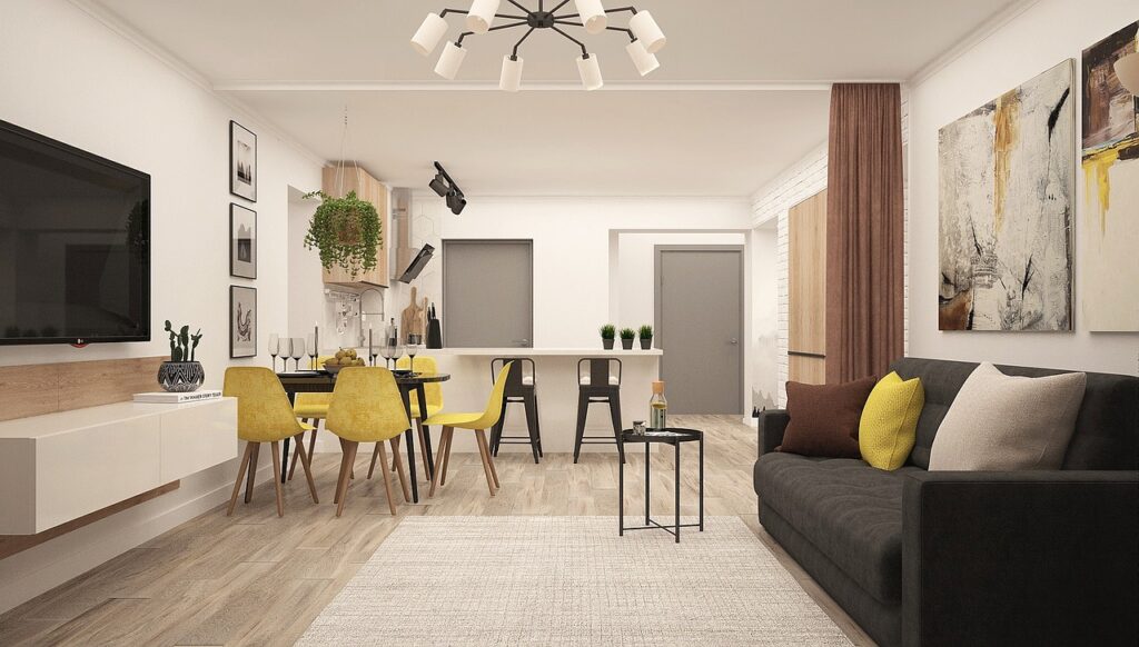 Ejemplo de decoración en apartamentos pequeños en colores amarillo y neutros.