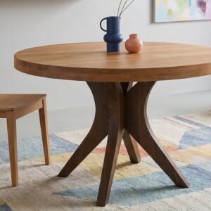 Mesa de comedor redonda de madera natural con patas centrales de diseño moderno