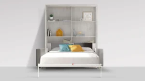Cama abatible abierta con sofá integrado convertida en dormitorio completo