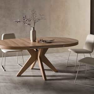 mesa extensible redonda roma de madera abierta en comedor moderno
