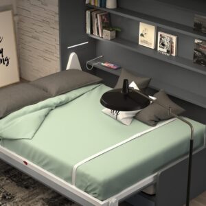 Detalle de cama abatible con sofá 150