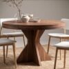 Mesa de comedor extensible Pata K redonda con acabado madera y base central geométrica